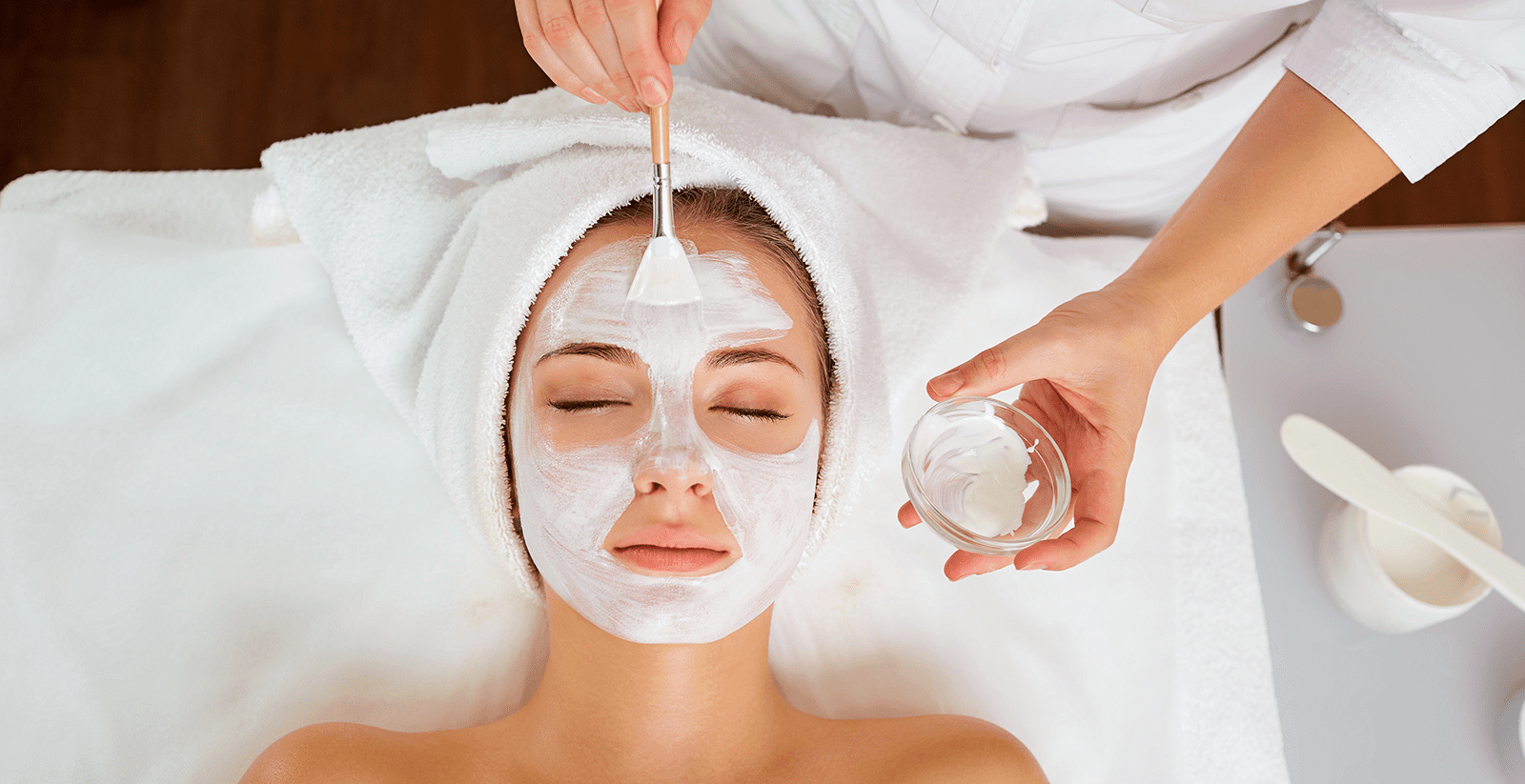 woman receiving a facial at Kontour for radiant skin