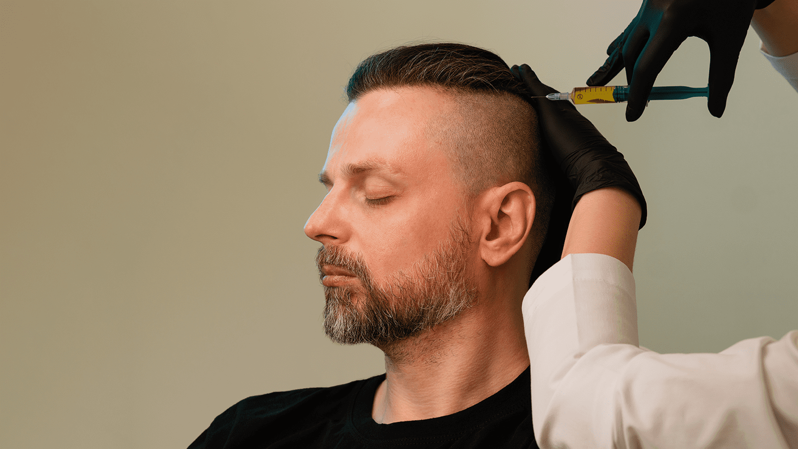 man receiving PRP hair restoration at Kontour in London ON